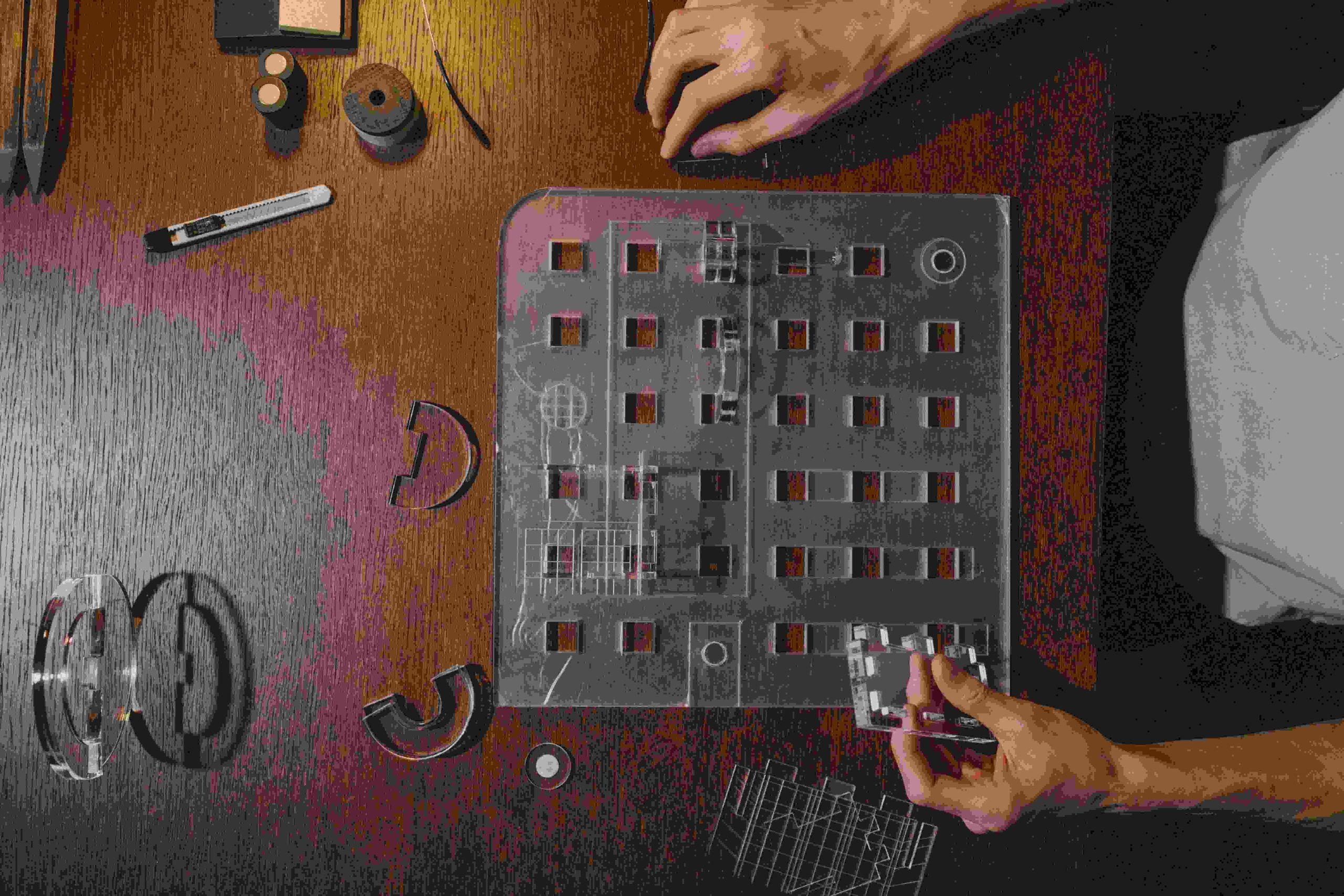 person deconstructing complex problem into base elements